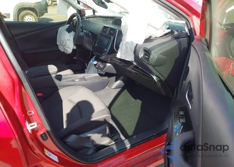 2021 Toyota Prius L Eco from USA, damaged, VIN JTDKAMFU5M3152710